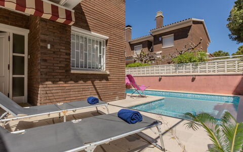 Canyadell: Residential Area, Outdoor Furniture, Home, Composite Material, Swimming Pool, Brick, Chair, Shade, Yard, Estate
