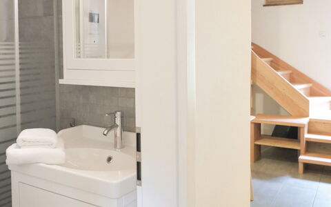 Rustico la Dimora: Mirror, Tap, Sink, Bathroom Sink, Bathroom Cabinet, Plumbing Fixture, Wood, Bathroom, Floor, Building