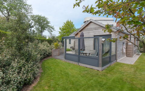 Klemskerkestraat with Terrace: Plant, Sky, Building, Tree, Land Lot, Window, Natural Landscape, Grass, Cottage, Siding