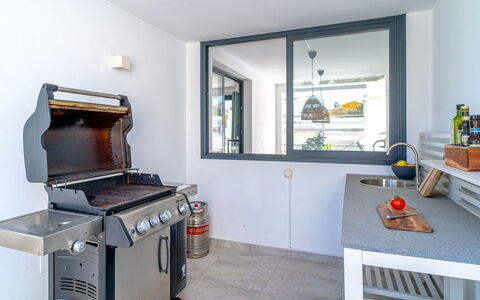 Aldea: Building, Kitchen, Cabinetry, Countertop, Kitchen Appliance, Kitchen Stove, Home Appliance, Interior Design, Wood, Floor