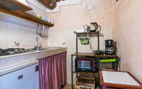 Santa Margherita: Cabinetry, Wood, Countertop, Building, Kitchen Stove, Kitchen, Table, Kitchen Appliance, Tap, Hardwood