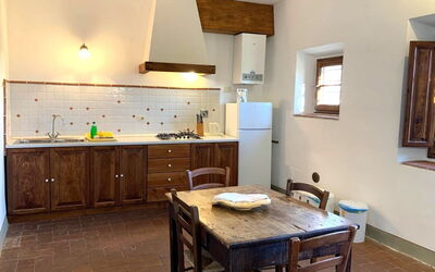 Le Fonti 11: Flooring, Furniture, Interior Design, Wood, Ceiling, Kitchen, Floor, Countertop, Room, Kitchen Appliance