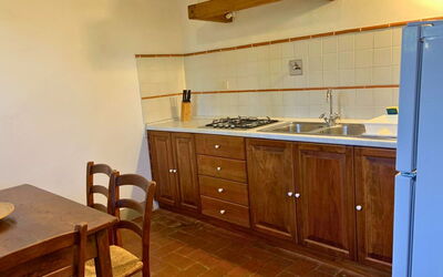 Le Fonti 15: Wood, Flooring, Countertop, Kitchen, Kitchen Appliance, Cabinetry, Interior Design, Major Appliance, Floor, Furniture