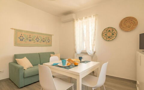 Arzachena 700: Furniture, Interior Design, Flooring, Floor, Wood, Table, Room, Apartment, Living Room, Ceiling