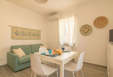 Arzachena 700: Furniture, Interior Design, Flooring, Floor, Wood, Table, Room, Apartment, Living Room, Ceiling