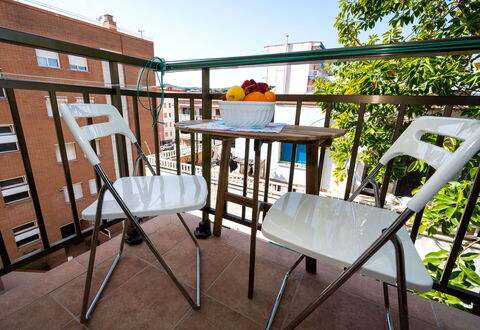 Riumar: Furniture, Property, Sky, Building, Chair, Wood, Outdoor Furniture, Shade, Architecture, Interior Design
