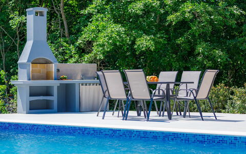 Eroa: Water, Plant, Building, Daytime, Property, Sky, Swimming Pool, Azure, Tree, Body Of Water