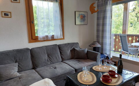 Le Tagre: Table, Furniture, Property, Couch, Window, Interior Design, Lighting, Wood, Living Room, Floor