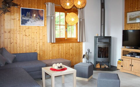 Chalet les Pitchounes: Table, Furniture, Property, Window, Picture Frame, Couch, Wood, Comfort, Lighting, Interior Design