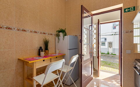 Magnolia: Plant, Table, Furniture, Building, Houseplant, Chair, Wood, Window, Interior Design, Flowerpot