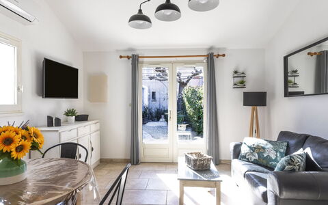 Val D'Alpilles: Table, Furniture, Picture Frame, Interior Design, Window, Lighting, Floor, Living Room, Flooring, Wood