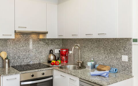 Montse: Kitchen, Countertop, Kitchen Appliance, Major Appliance, Interior Design, Cabinetry, Flooring, Kitchen Stove, Home Appliance, Floor
