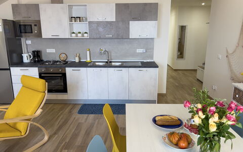 Vista Mare Borgo Peri: Furniture, Cabinetry, Flower, Table, Property, Sink, Chair, Countertop, Tap, Tableware