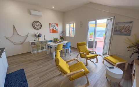 Vista Mare Borgo Peri: Furniture, Houseplant, Plant, Picture Frame, Chair, Flowerpot, Interior Design, Wood, Flooring, Building