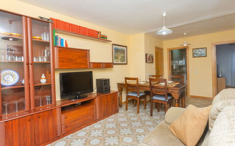 Nemesis: Furniture, Cabinetry, Wood, Home Appliance, Television, Living Room, Picture Frame, Lighting, Flooring, Interior Design
