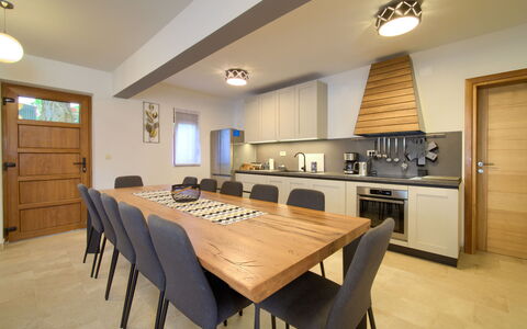 Magna Tilia: Furniture, Table, Cabinetry, Countertop, Wood, Kitchen, Chair, Lighting, House, Interior Design