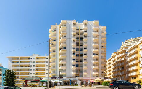 Sweet Ocean: Water, Sky, Property, Plant, Building, Cloud, Swimming Pool, Tree, Residential Area, Grass
