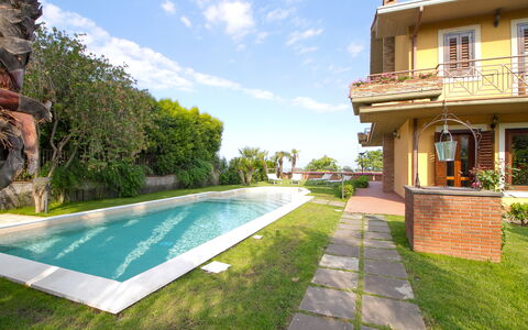 Villa Tricca: Water, Plant, Cloud, Sky, Property, Building, Window, Tree, Swimming Pool, Grass