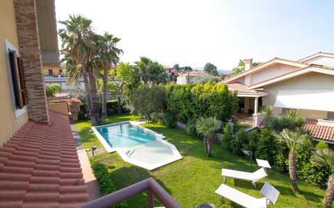 Villa Tricca: Plant, Sky, Property, Building, Window, Tree, Water, Swimming Pool, Grass, Outdoor Furniture