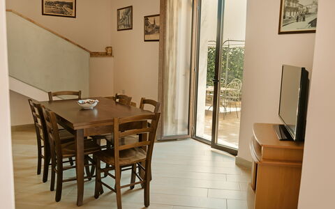 Villa Saponara: Furniture, Flooring, Wood, Interior Design, Floor, Kitchen & Dining Room Table, Table, Chair, Dining Room, Room