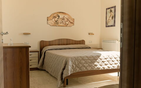 Etna Suites: Furniture, Bed, Bedroom, Interior Design, Wood, Bed Sheet, Bedding, Floor, Flooring, Room
