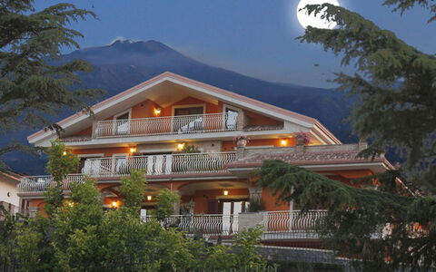 Etna Suites: Sky, Plant, Property, Building, Light, Nature, Botany, Tree, Mountain, Window