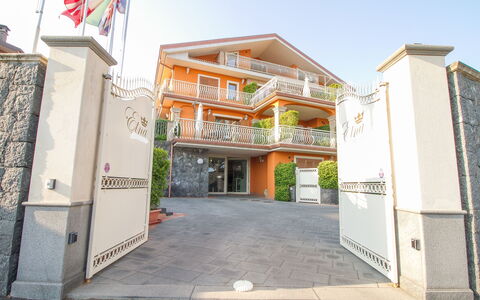 Etna Suites: Sky, Property, Building, Window, Urban Design, Residential Area, Facade, Real Estate, Door