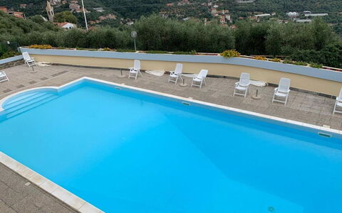 Verde Adagio: Water, Building, Swimming Pool, Azure, Plant, Rectangle, Architecture, Outdoor Furniture, Shade, Composite Material
