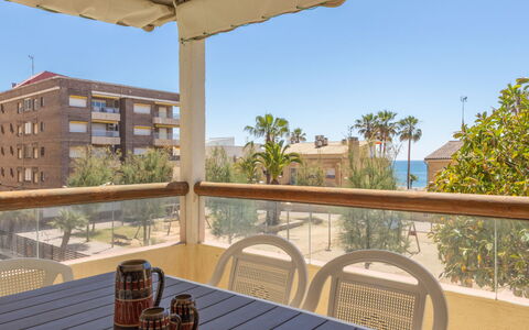 Antina Mar: Sky, Table, Building, Furniture, Property, Chair, Tableware, Shade, Flowerpot, Wood