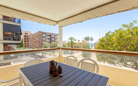 Antina Mar: Building, Table, Shade, Wood, Tableware, Outdoor Furniture, Interior Design, Porch, Sky, Condominium
