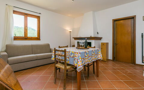 Dependance di Villa Magna: Table, Property, Couch, Furniture, Window, Wood, Picture Frame, Living Room, Interior Design, Chair