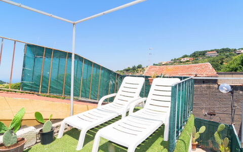 Mansardina sui Due Golfi: Sky, Plant, Sunlounger, Outdoor Furniture, Shade, Comfort, Land Lot, Grass, Wood, Rectangle