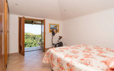 Mansardina sui Due Golfi: Building, Furniture, Comfort, Wood, Textile, Door, Interior Design, Floor, Flooring