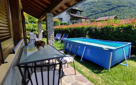Mina: Plant, Building, Property, Green, Shade, Outdoor Furniture, Tree, House, Wood, Leisure