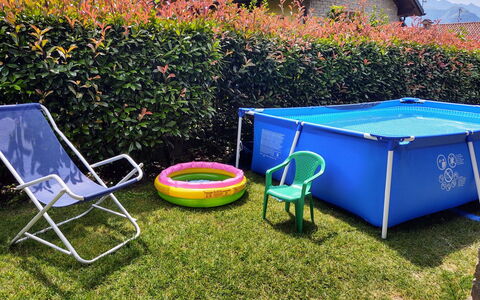 Mina: Plant, Furniture, Green, Azure, Outdoor Furniture, Outdoor Table, Table, Building, Rectangle, House