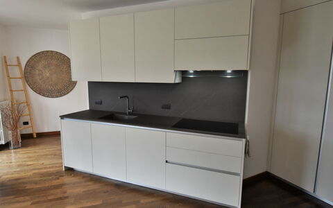 Valley View Pool Apartment: Cabinetry, Countertop, Wood, Kitchen, Interior Design, Flooring, Floor, Hardwood, Wood Stain, Ceiling