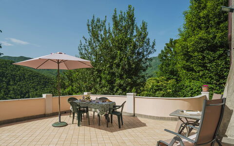 Stella: Table, Furniture, Property, Sky, Chair, Plant, Shade, Outdoor Table, Cloud, Outdoor Furniture