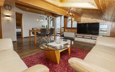 Brienz Sunset: Interior Design, Furniture, Flooring, Floor, Wood, Ceiling, Couch, Room, Living Room, Lighting