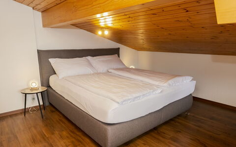 Brienz Sunset: Bed, Interior Design, Bedroom, Bed Sheet, Floor, Ceiling, Bedding, Room, Flooring, Bed Frame
