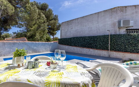 Moru: Sky, Daytime, Property, Furniture, Table, Plant, Chair, Cloud, Outdoor Furniture, Shade