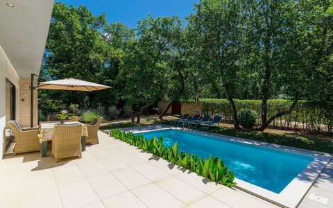 Villa Frleti: Water, Plant, Sky, Building, Swimming Pool, Umbrella, Azure, Tree, Shade, Outdoor Furniture