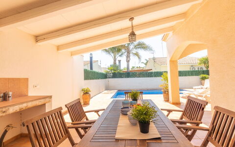 Marinera: Table, Plant, Furniture, Property, Couch, Chair, Building, Houseplant, Shade, Water