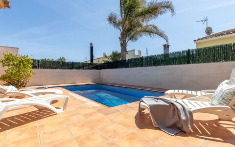 Marinera: Sky, Water, Plant, Swimming Pool, Tree, Interior Design, Shade, Arecales, Outdoor Furniture, Condominium