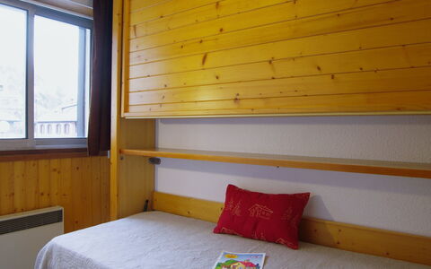 Chamonix 10: Room, Bed, Furniture, Bedroom, Property, Yellow, Bed Sheet, Interior Design, Wall, Bedding