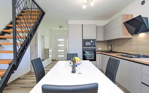 Aurora: Flooring, Interior Design, Wood, Floor, Furniture, Home, Countertop, Kitchen, Room, Door