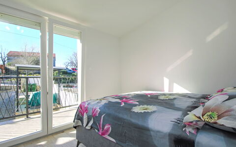 Aurora: Floor, Apartment, Home, Daylighting, Bedroom, Design, Bed, Wood Stain, Linens, Balcony