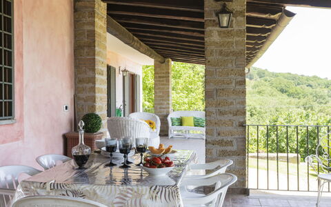 Villa Bougainvillea: Furniture, Plant, Window, Building, Table, Porch, Flowerpot, Chair, Houseplant, Wood