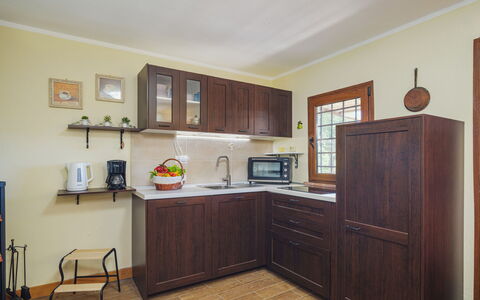 Il Nido: Cabinetry, Furniture, Countertop, Property, Building, Kitchen Appliance, Home Appliance, Kitchen, Wood, Drawer