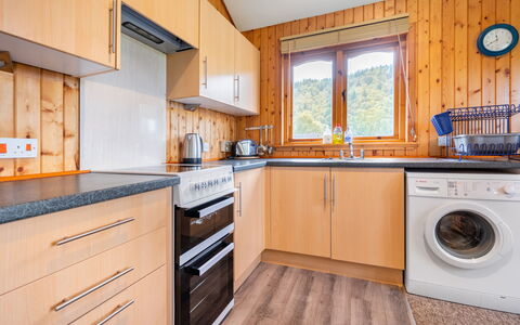 Drumnadrochit 700: Cabinetry, Countertop, Property, Laundry Room, Furniture, Kitchen, Kitchen Stove, Kitchen Sink, Kitchen Appliance, Wood