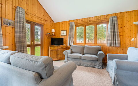 Balnain 3 Bed: Furniture, Plant, Window, Couch, Azure, Picture Frame, Table, Wood, Building, Comfort